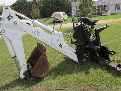 bobcat 911 hydraulic skid steer backhoe|bobcat 773 backhoe attachment.